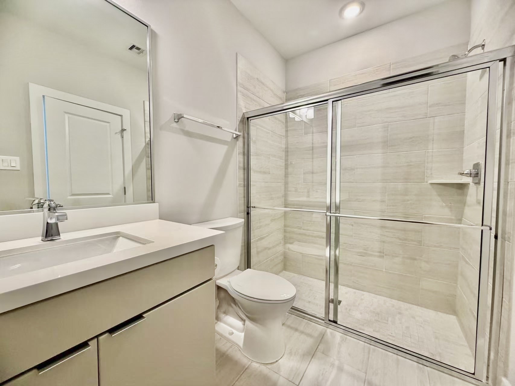 1254 North Post Oak Road, Unit B Houston, TX 77055 - Photo 18 of 25 a bathroom with a sink a toilet and shower