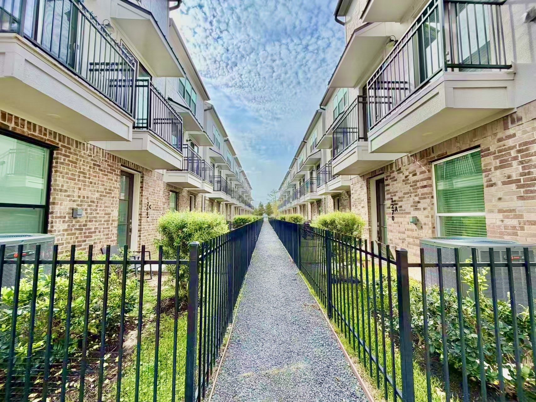 1254 North Post Oak Road, Unit B Houston, TX 77055 - Photo 23 of 25 a view of a house with wooden stairs