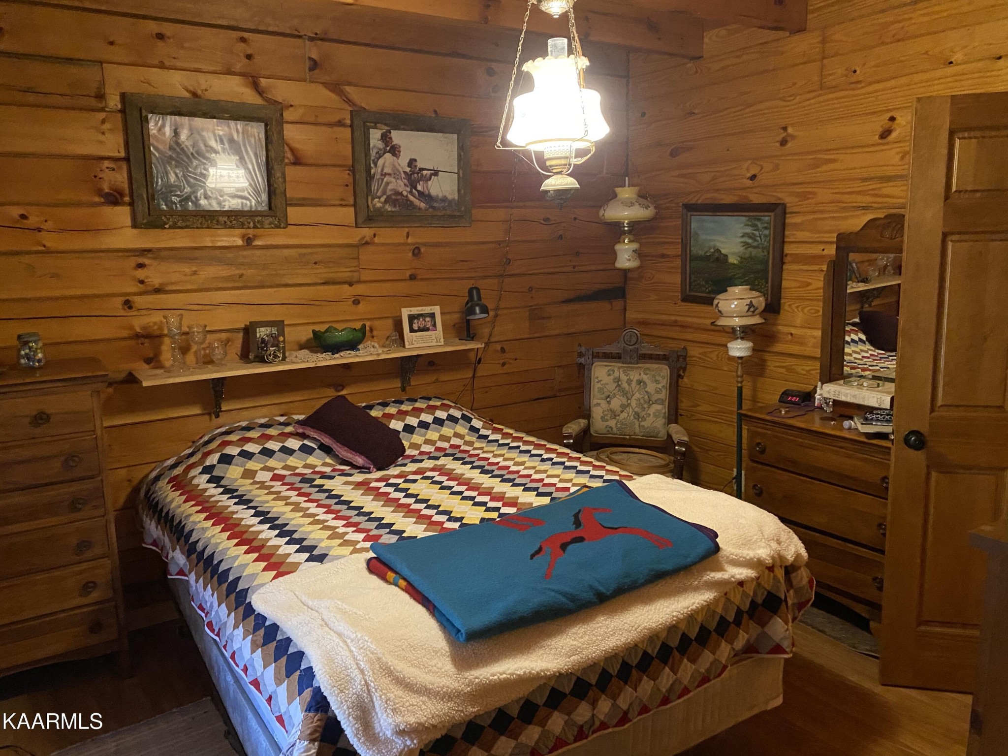755 Compton Bottom Drive Jamestown, TN 38556 - Photo 12 of 24 a bedroom with a bed and dresser