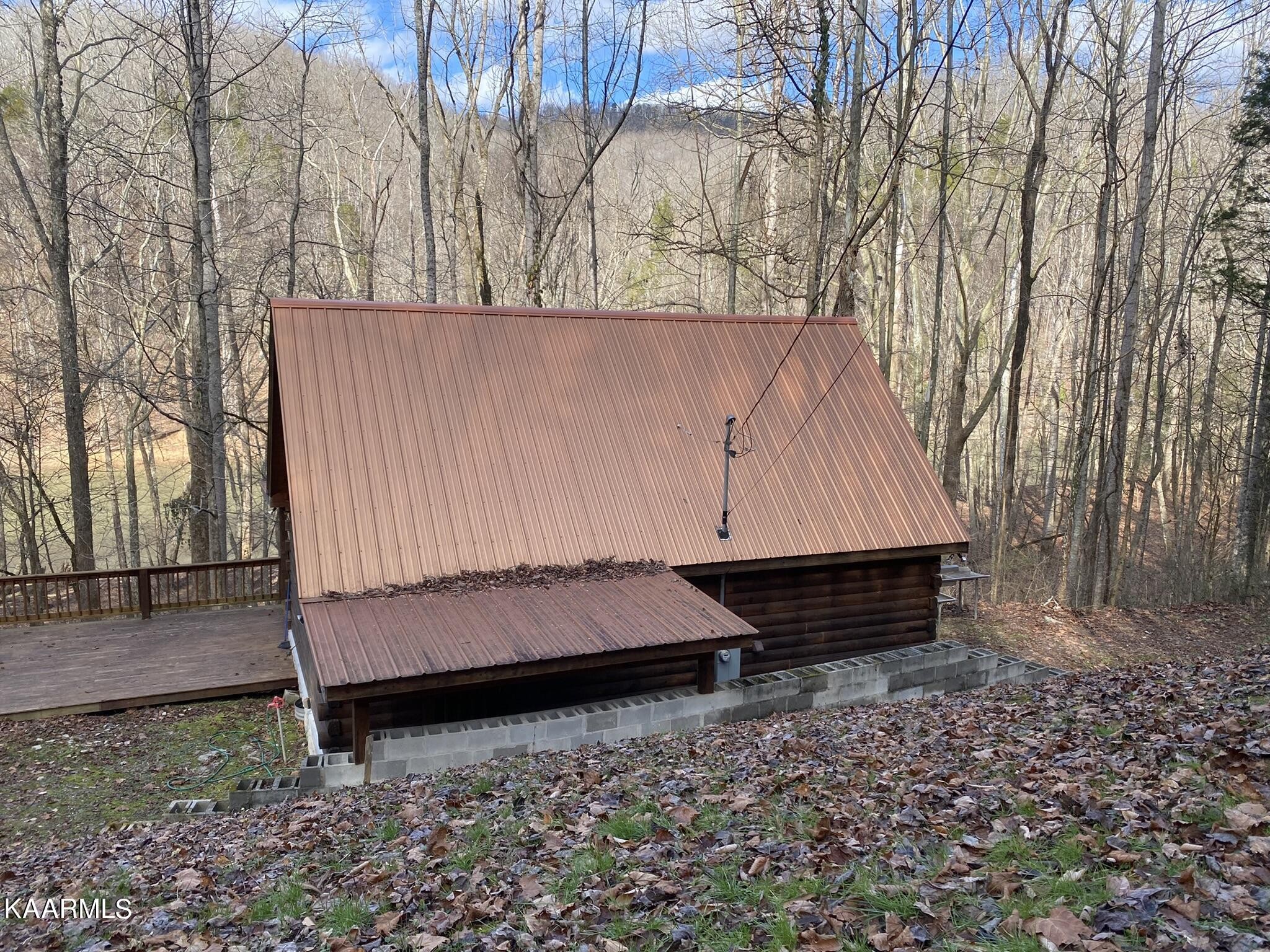 755 Compton Bottom Drive Jamestown, TN 38556 - Photo 2 of 24 a yard with wooden fence