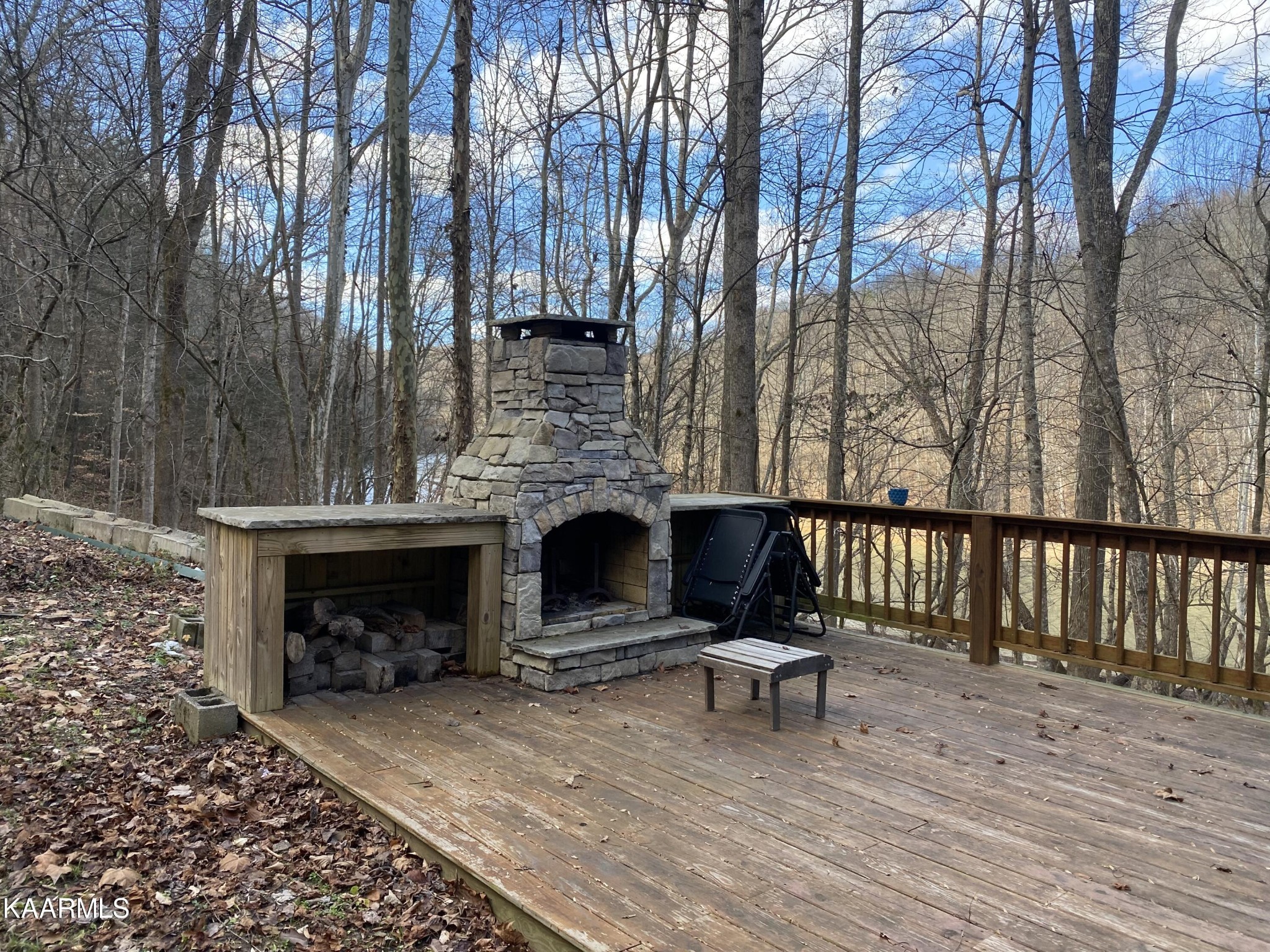 755 Compton Bottom Drive Jamestown, TN 38556 - Photo 4 of 24 a building outdoor space with patio furniture and a fireplace