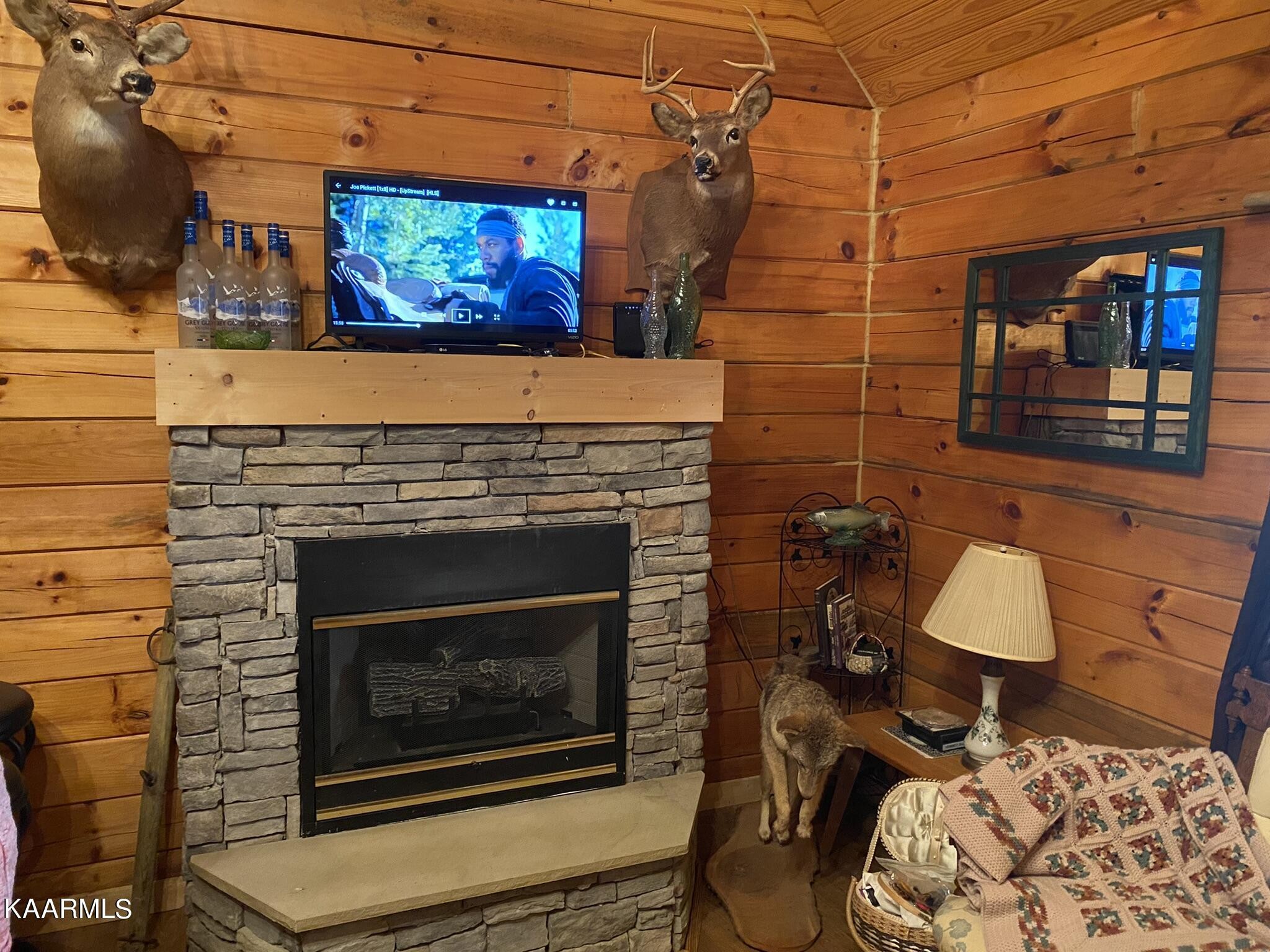 755 Compton Bottom Drive Jamestown, TN 38556 - Photo 8 of 24 a living room with furniture and a fireplace