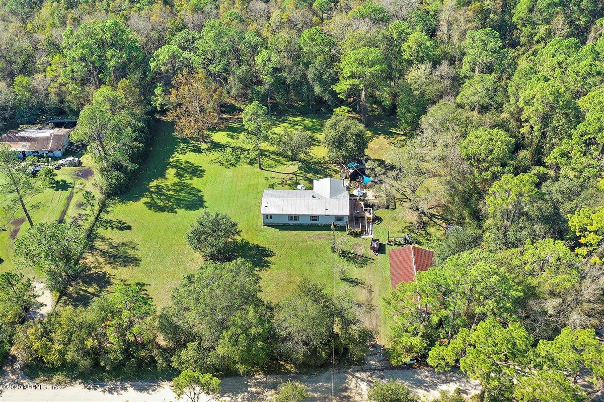 2987 Green Acres Road St. Augustine, FL 32084 - Photo 2 of 31 an aerial view of a house with a yard
