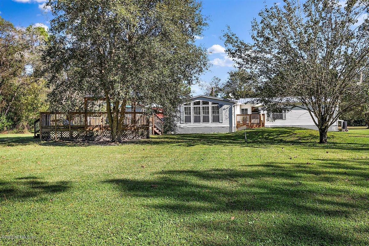 2987 Green Acres Road St. Augustine, FL 32084 - Photo 26 of 31 a house view with a garden space