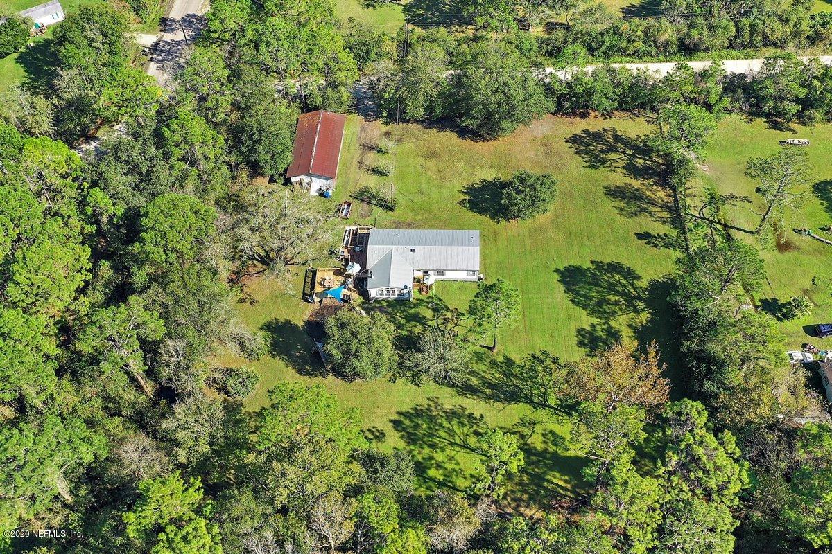 2987 Green Acres Road St. Augustine, FL 32084 - Photo 29 of 31 an aerial view of residential house with outdoor space and swimming pool
