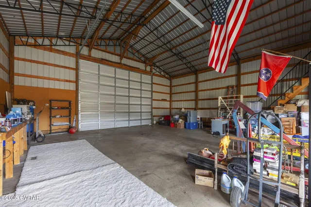 a view of a garage with parked cars