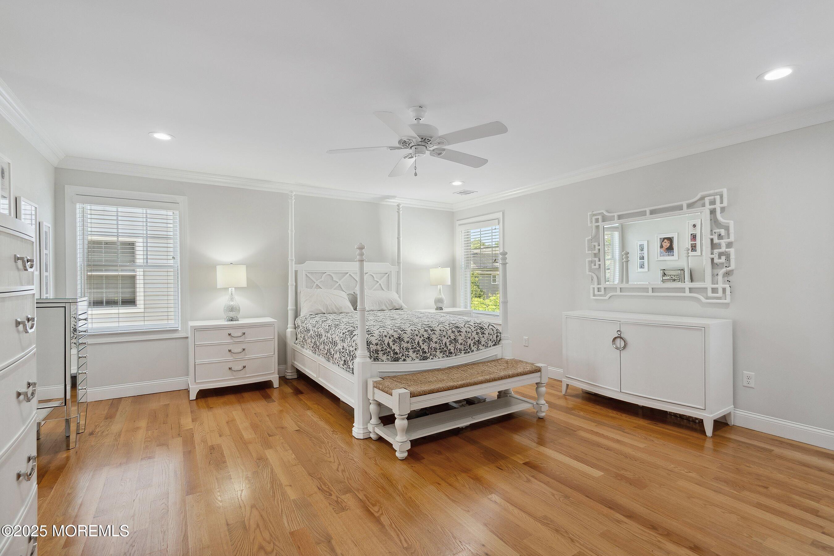 309 Hall Avenue Point Pleasant, NJ 08742 - Photo 14 of 35 a spacious bedroom with a bed and a table
