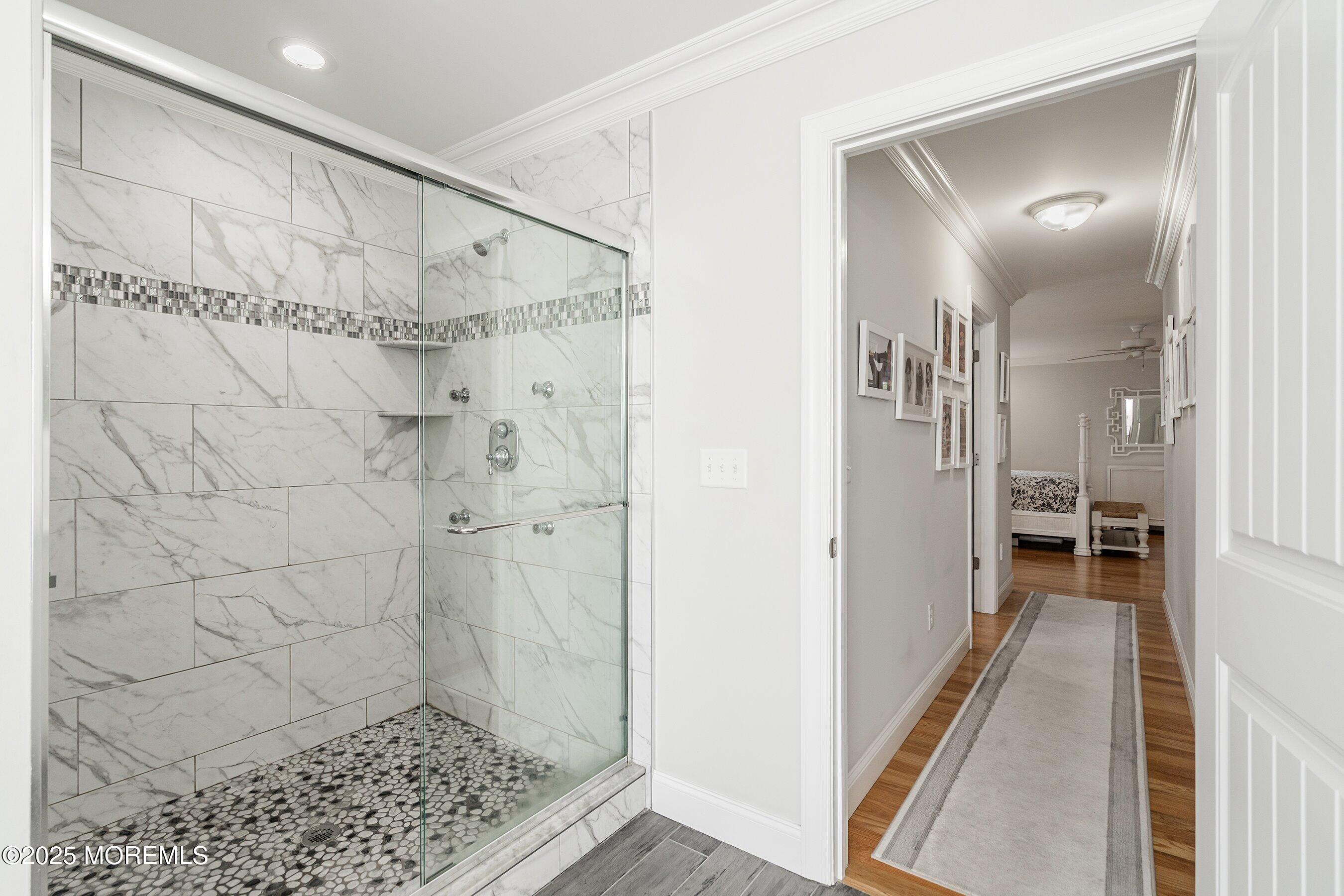 309 Hall Avenue Point Pleasant, NJ 08742 - Photo 16 of 35 a bathroom with a glass shower door