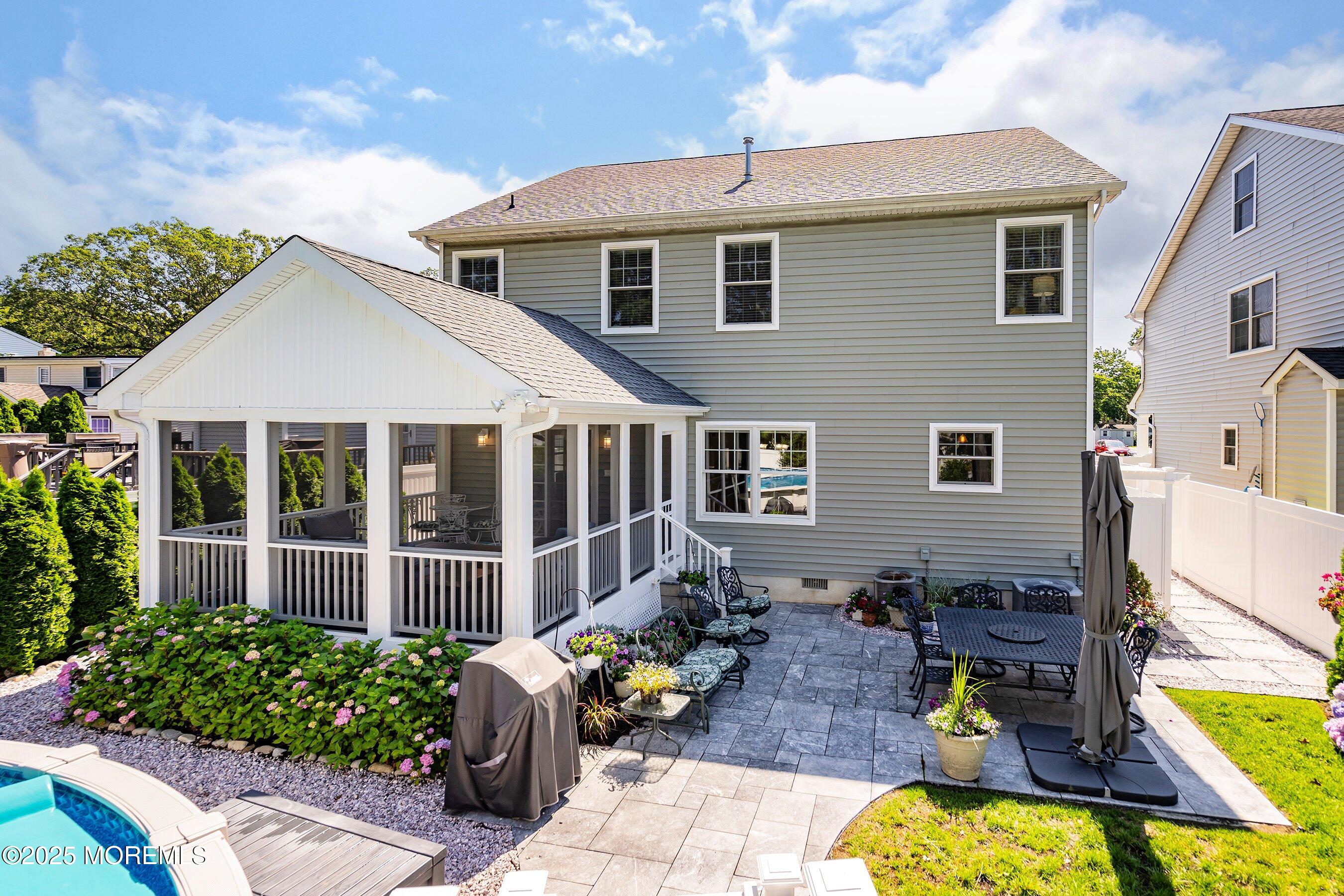 309 Hall Avenue Point Pleasant, NJ 08742 - Photo 24 of 35 a front view of a house with garden