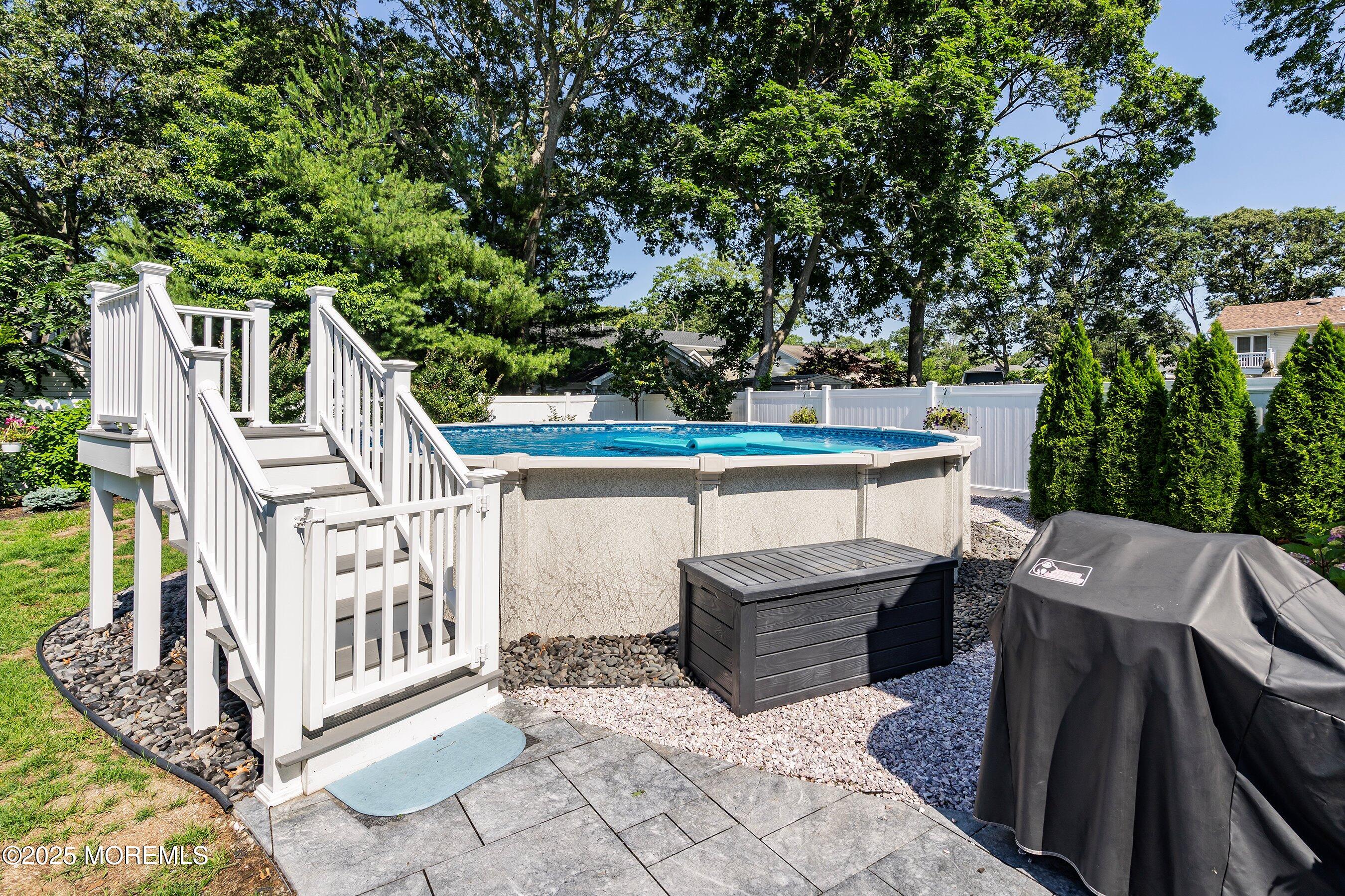 309 Hall Avenue Point Pleasant, NJ 08742 - Photo 26 of 35 a view of deck with furniture and trees