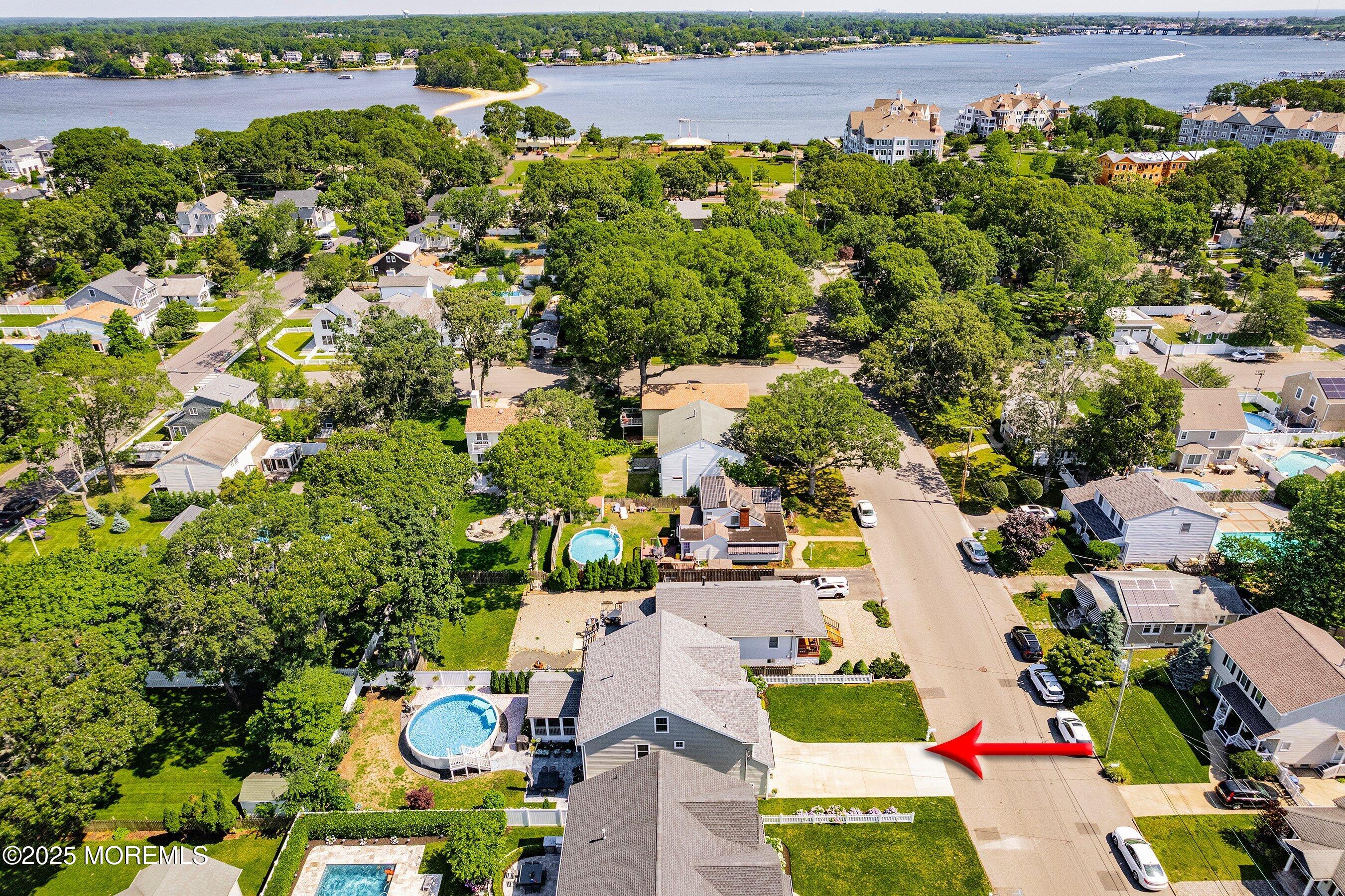 309 Hall Avenue Point Pleasant, NJ 08742 - Photo 27 of 35 a picture of street with lots of residential buildings and green space