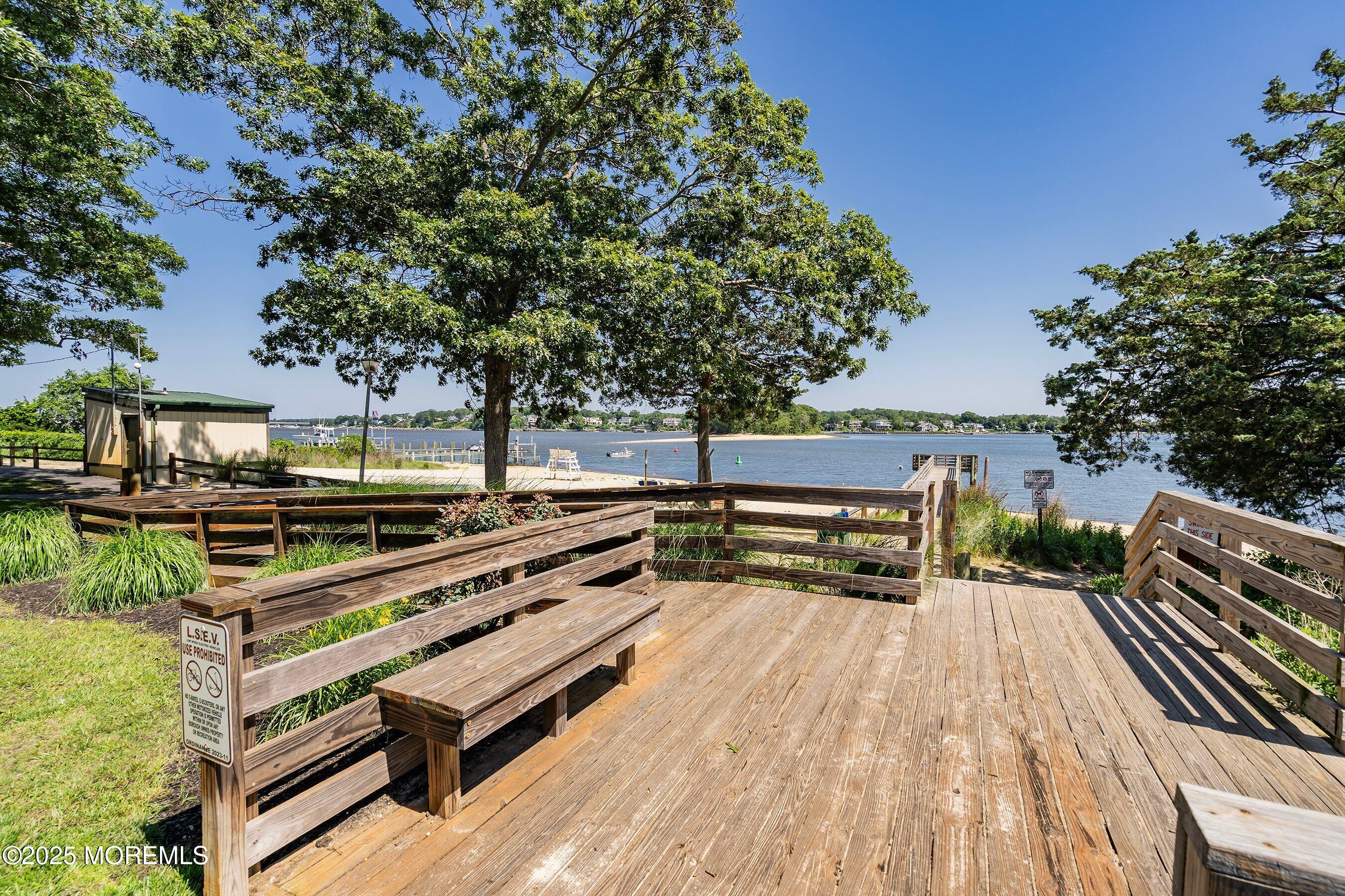 309 Hall Avenue Point Pleasant, NJ 08742 - Photo 31 of 35 a view of a wooden bench with chairs in the patio