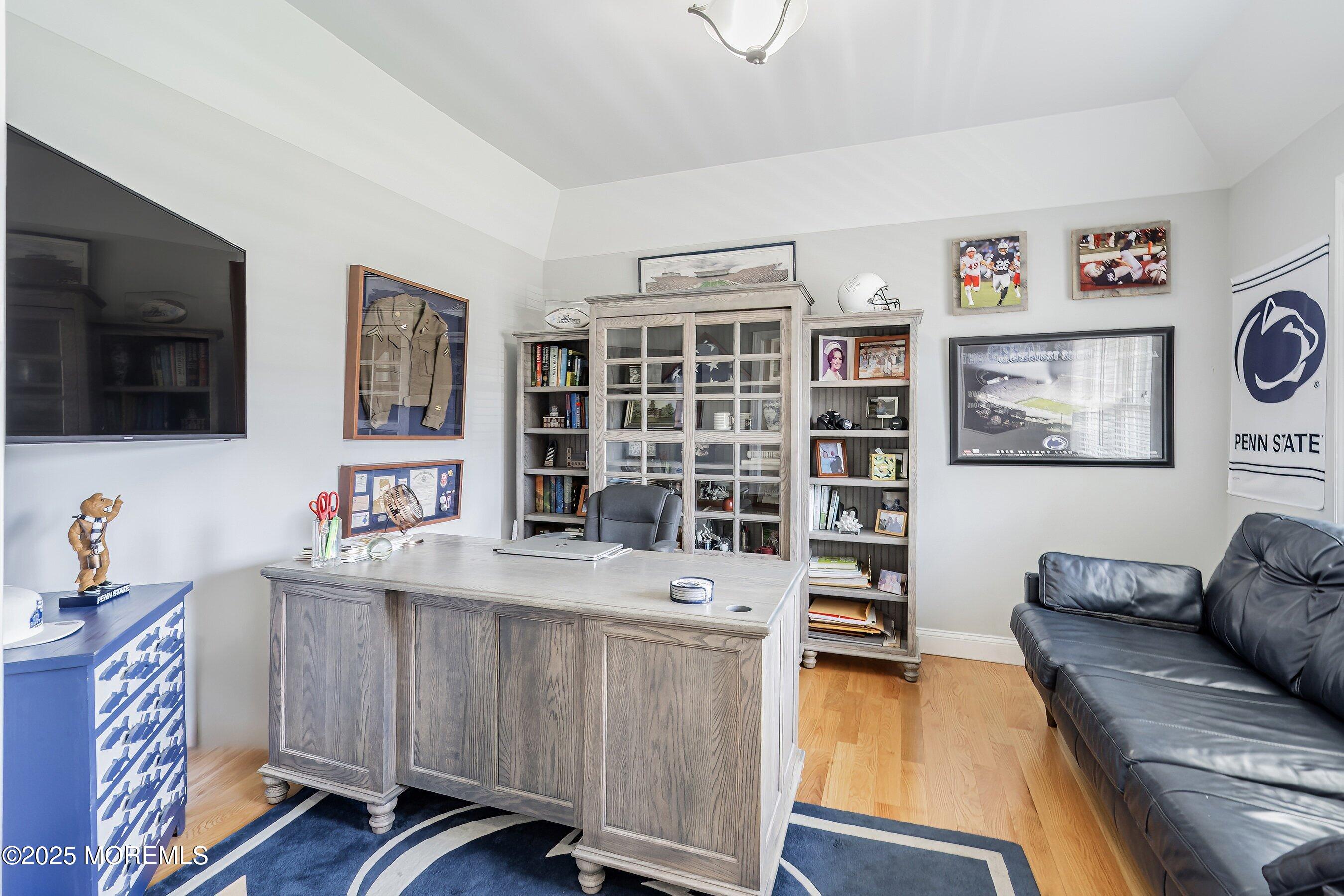 309 Hall Avenue Point Pleasant, NJ 08742 - Photo 4 of 35 a living room with furniture and a flat screen tv
