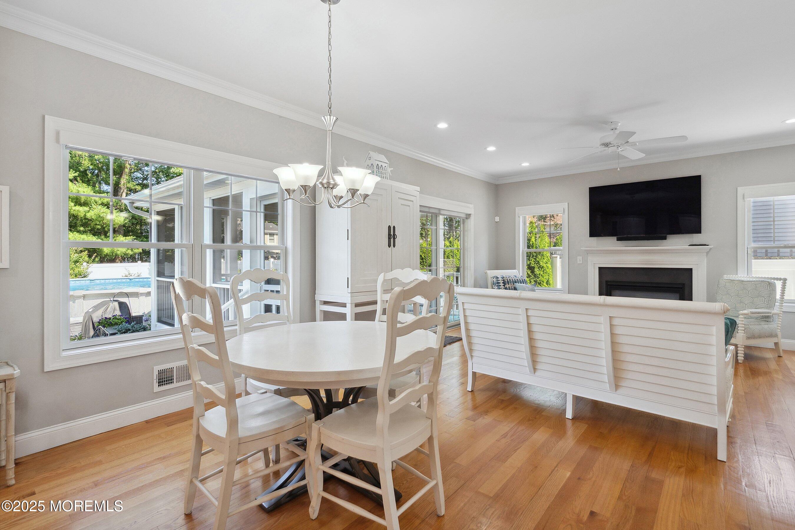 309 Hall Avenue Point Pleasant, NJ 08742 - Photo 9 of 35 a living room with furniture a flat screen tv and a large window