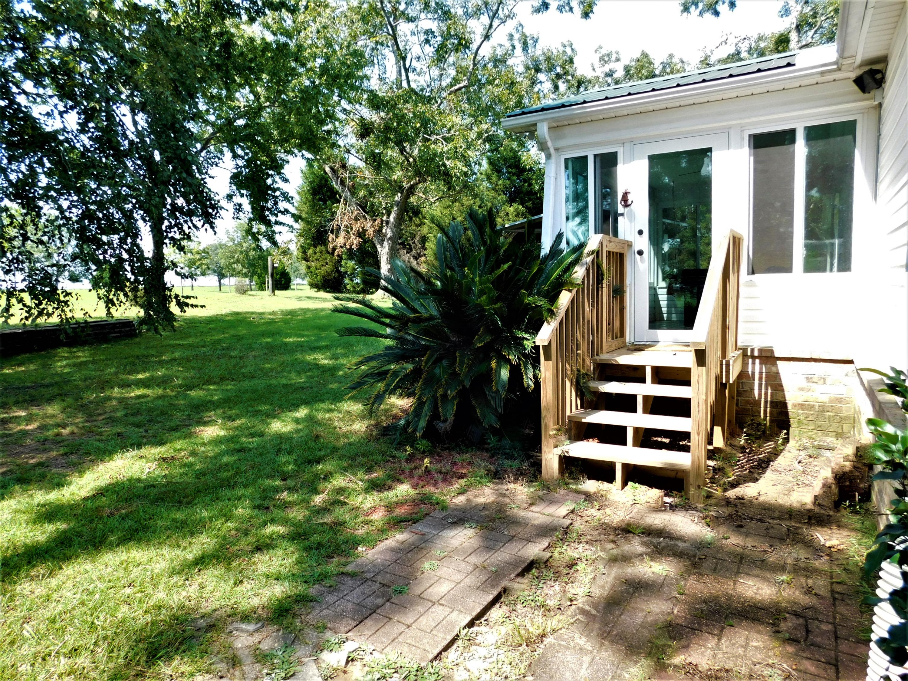 1533 Messick Road Baker, FL 32531 - Photo 6 of 40 a view of outdoor space yard and porch