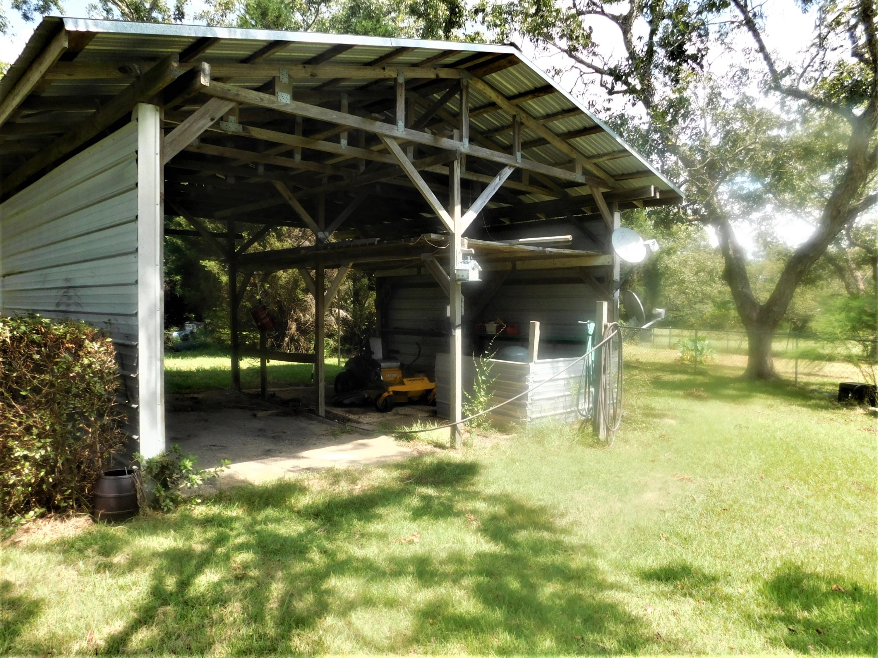 1533 Messick Road Baker, FL 32531 - Photo 9 of 40 a view of a car park in front of house