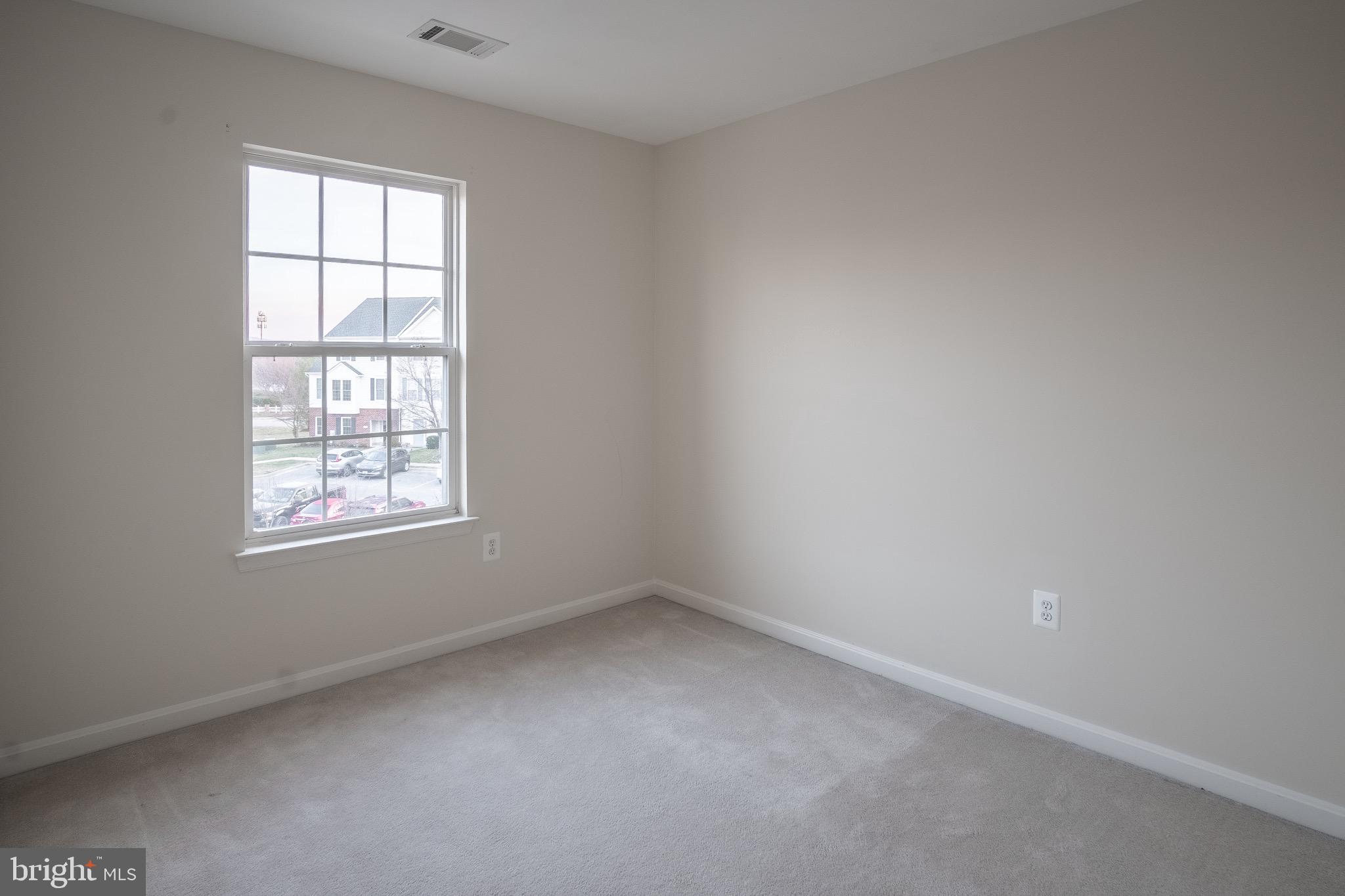 104 Penwick Circle Frederick, MD 21702 - Photo 13 of 24 an empty room with a window