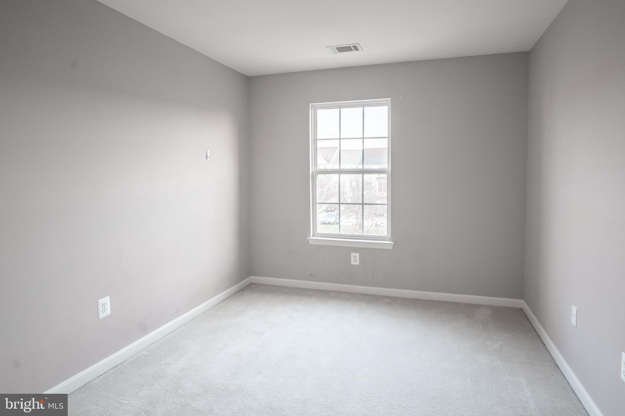 104 Penwick Circle Frederick, MD 21702 - Photo 14 of 24 an empty room with a window