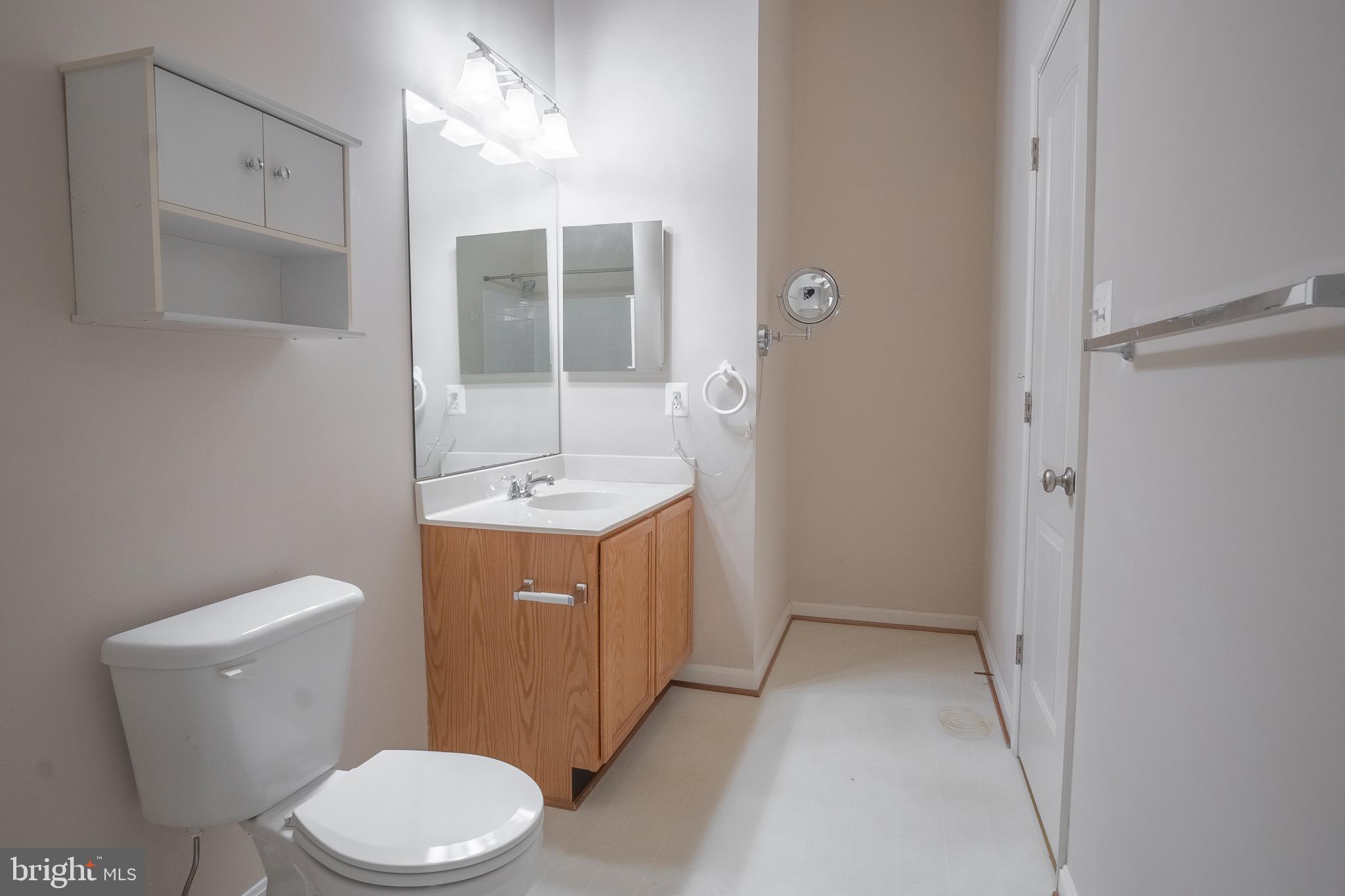 104 Penwick Circle Frederick, MD 21702 - Photo 19 of 24 a bathroom with a toilet sink and mirror