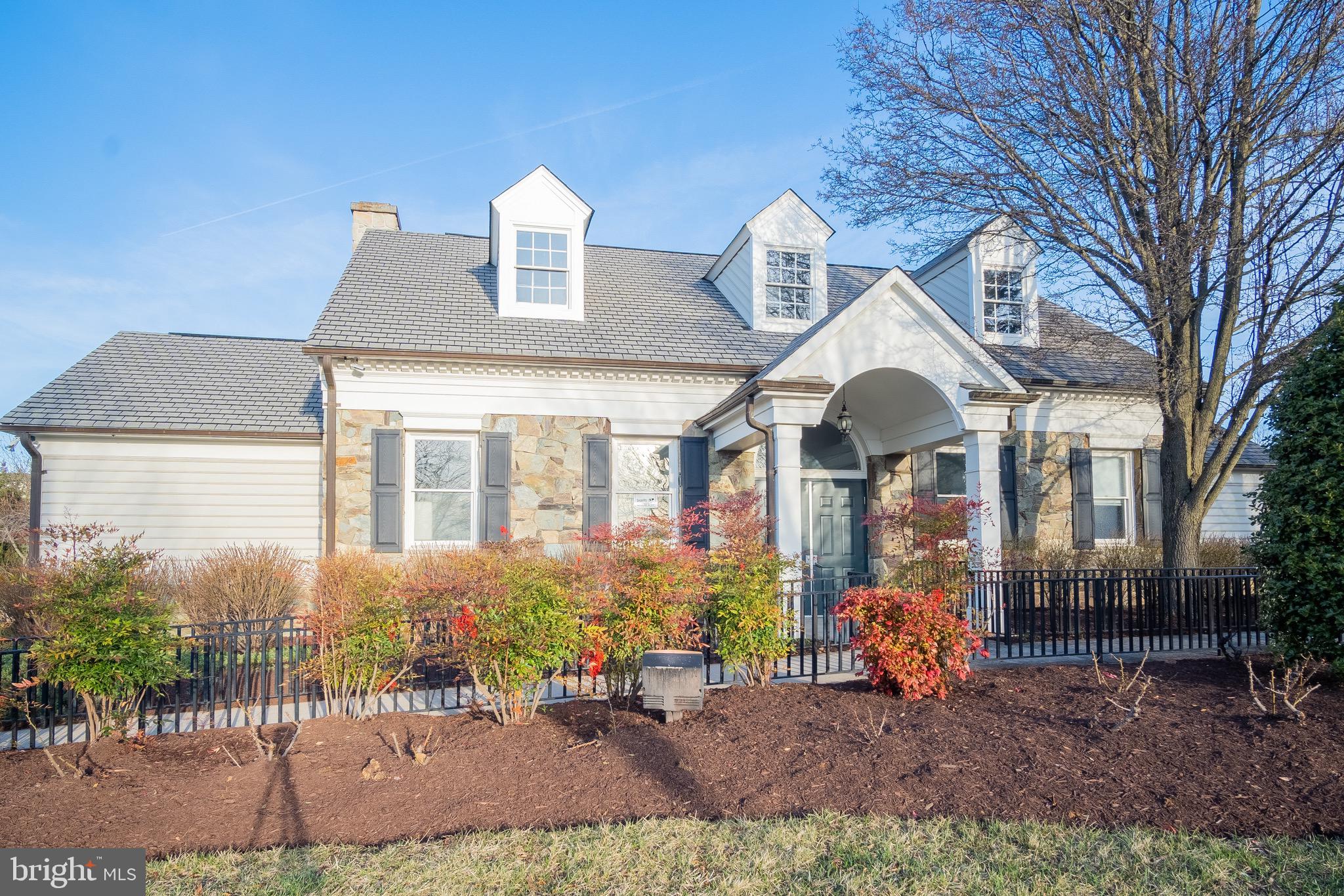 104 Penwick Circle Frederick, MD 21702 - Photo 23 of 24 a front view of a house with garden