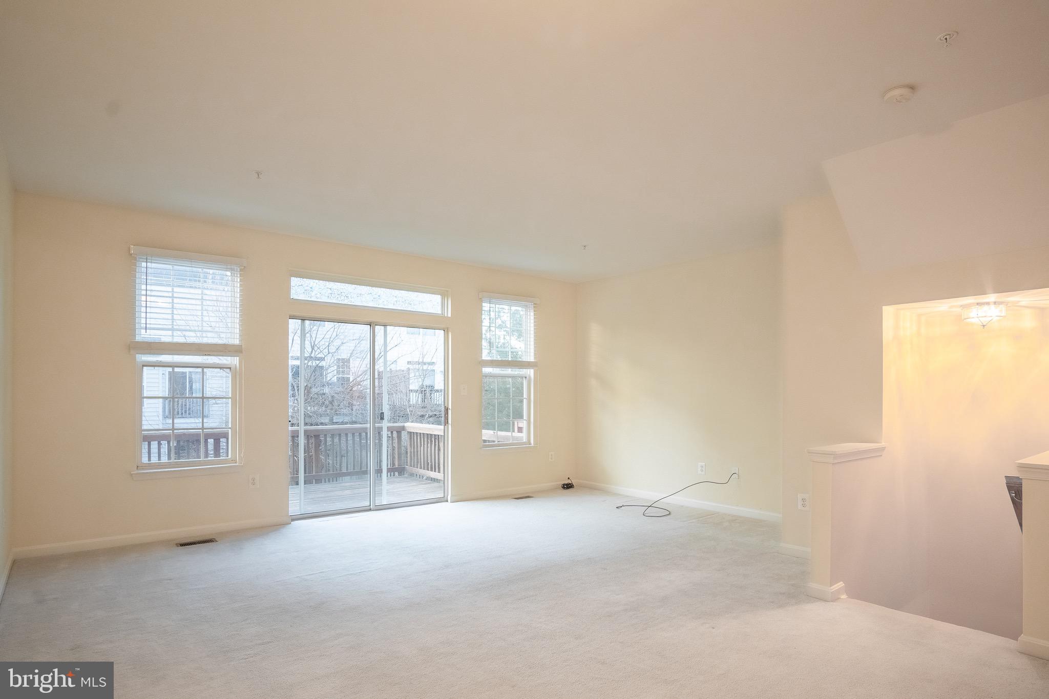 104 Penwick Circle Frederick, MD 21702 - Photo 9 of 24 an empty room with windows