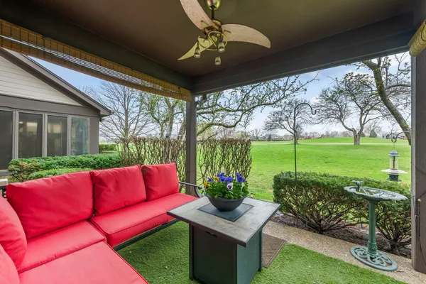 a view of a yard with furniture and a yard