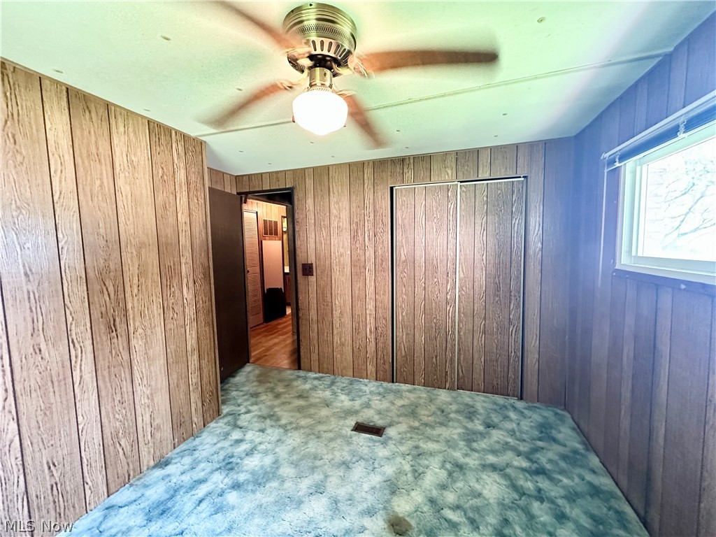 28 Richter Road Colliers, WV 26035 - Photo 15 of 38 Bedroom featuring ceiling fan and carpet flooring