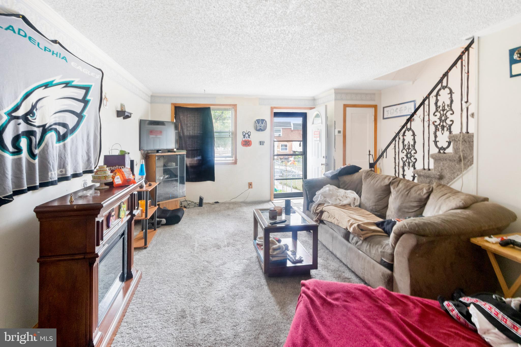 752 Bennington Road Folcroft, PA 19032 - Photo 2 of 11 a living room with furniture and a couch