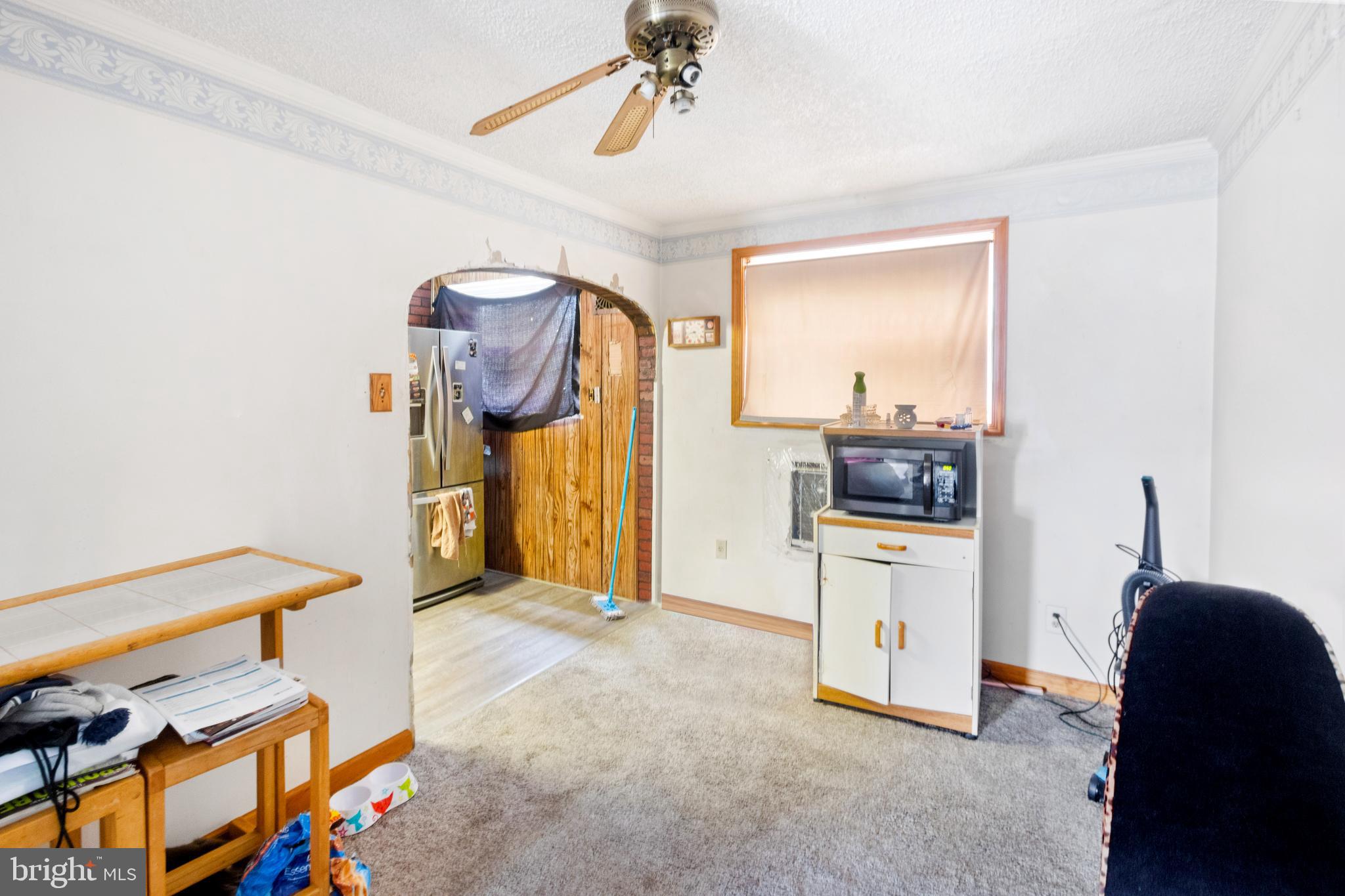 752 Bennington Road Folcroft, PA 19032 - Photo 3 of 11 a view of a livingroom with furniture and a window