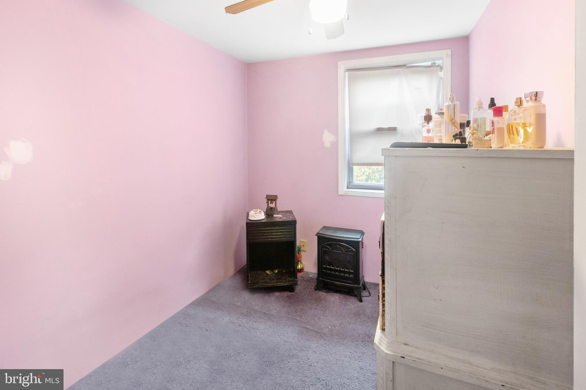 752 Bennington Road Folcroft, PA 19032 - Photo 8 of 11 a room with furniture and a mirror