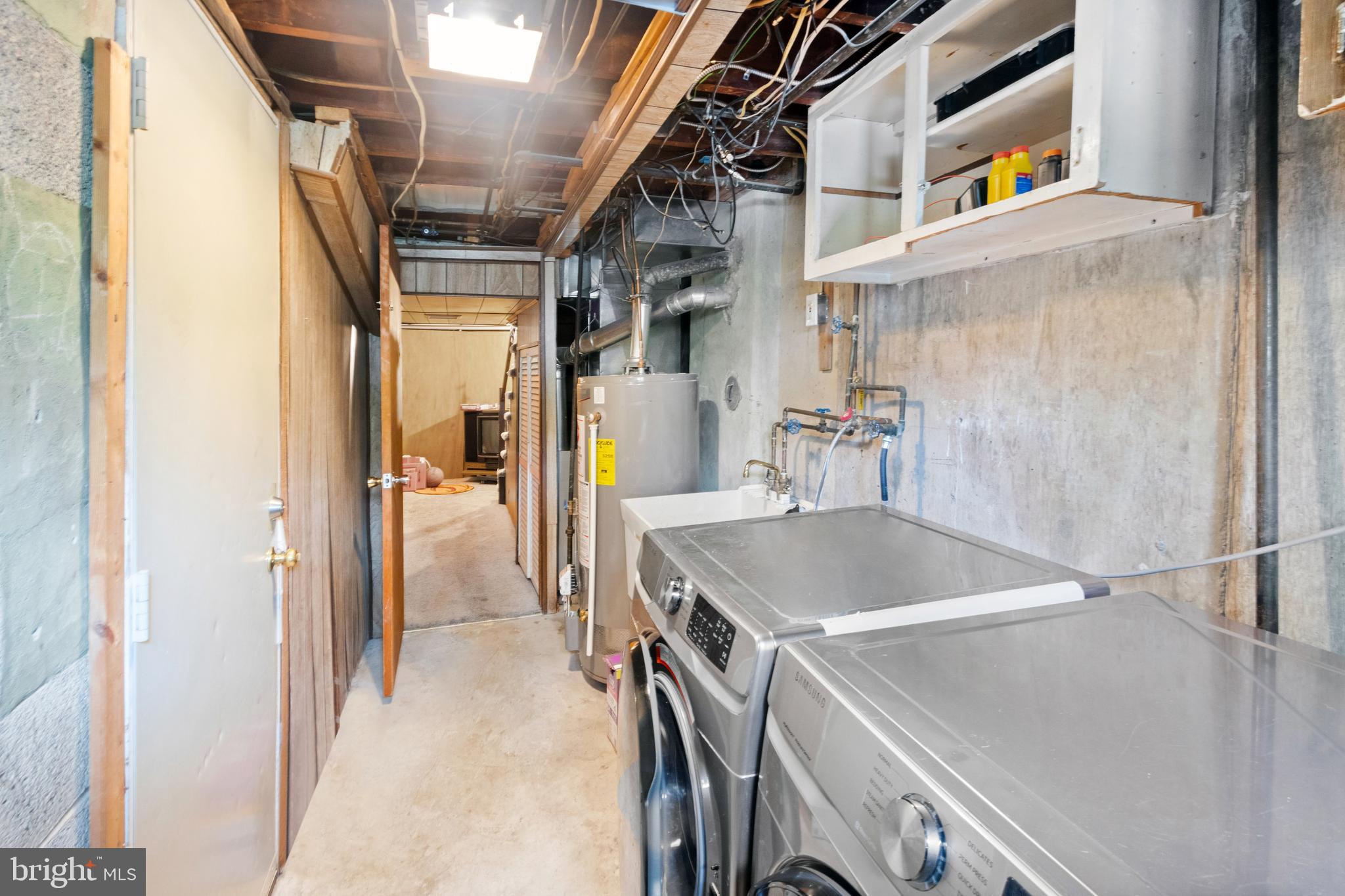 752 Bennington Road Folcroft, PA 19032 - Photo 10 of 11 a utility room with dryer and washer