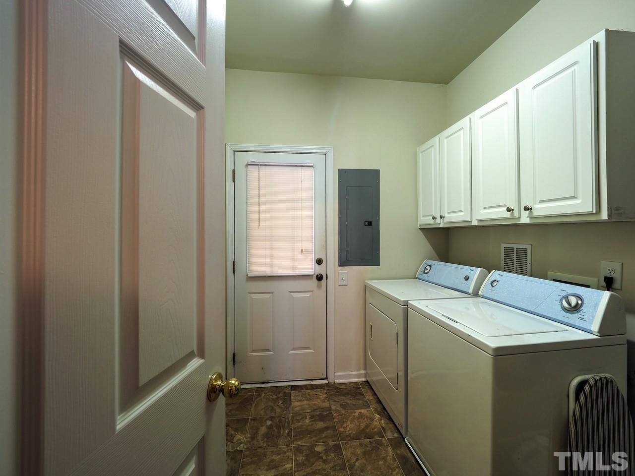 7250 Galon Glen Road Raleigh, NC 27613 - Photo 23 of 27 a utility room with dryer and washer