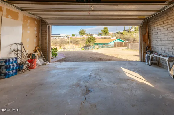 a view of garage with furniture