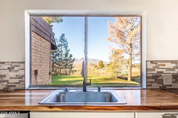 a view of a living room and window