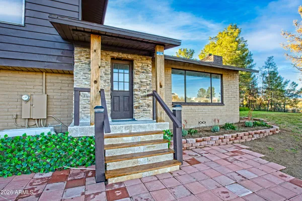 a front view of a house with a porch