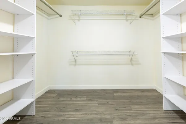 a view of an empty walk in closet
