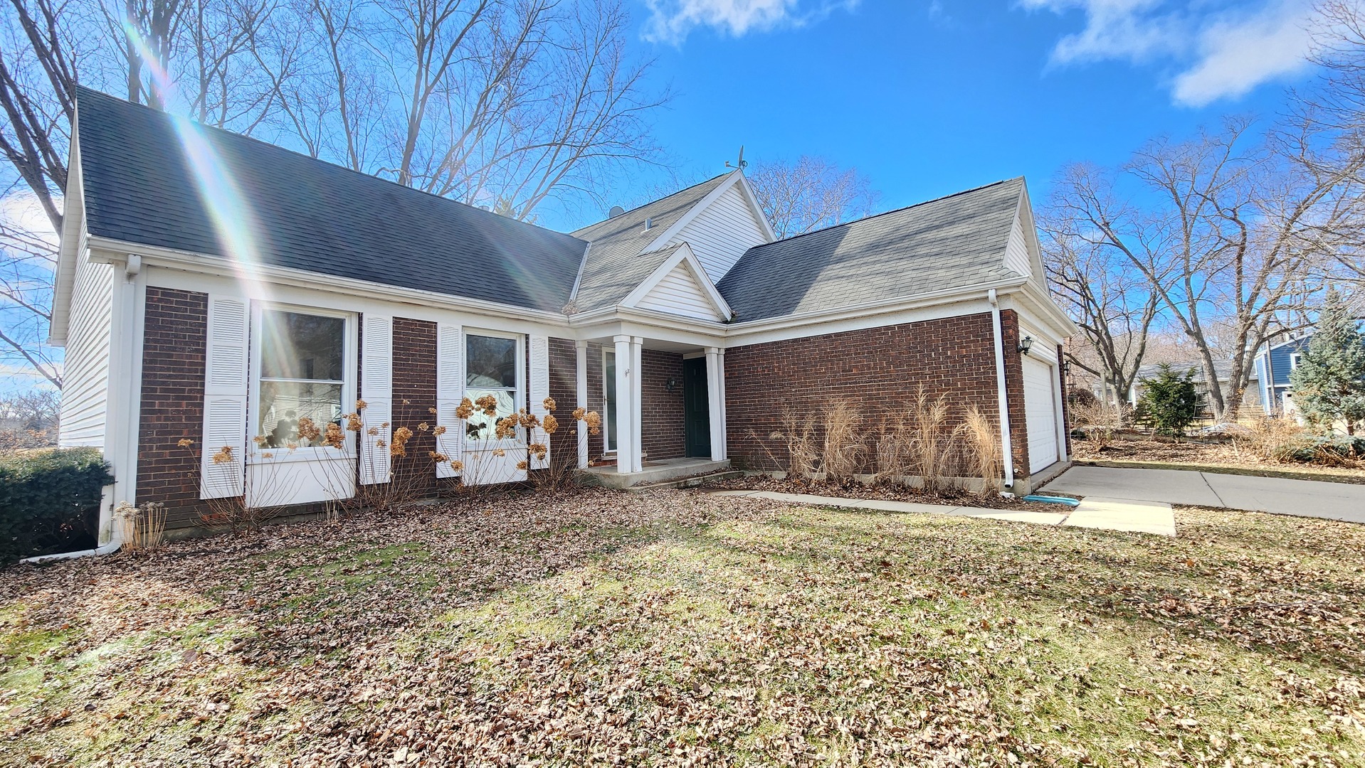5 Castlegate Court Vernon Hills, IL 60061 - Photo 2 of 25 a front view of a house with a patio