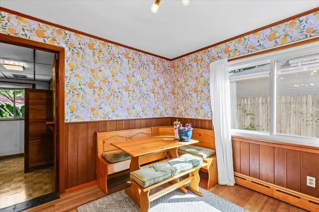 a blue bench sitting in front of a door