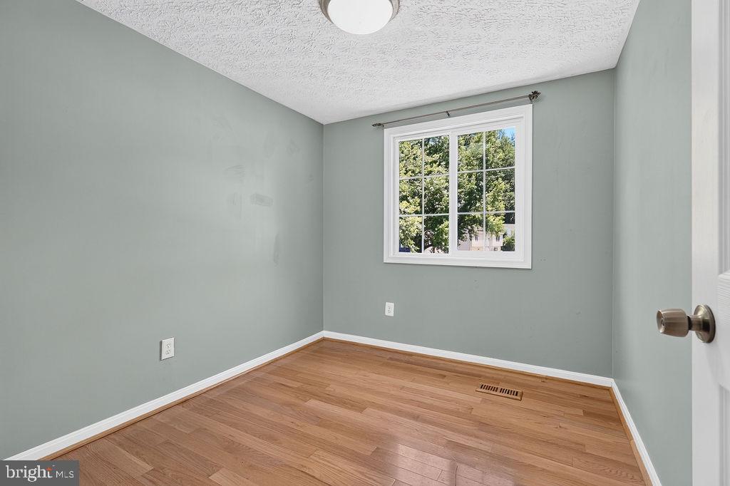 8471 Great Lake Lane Springfield, VA 22153 - Photo 26 of 65 a view of a room that has a window in it