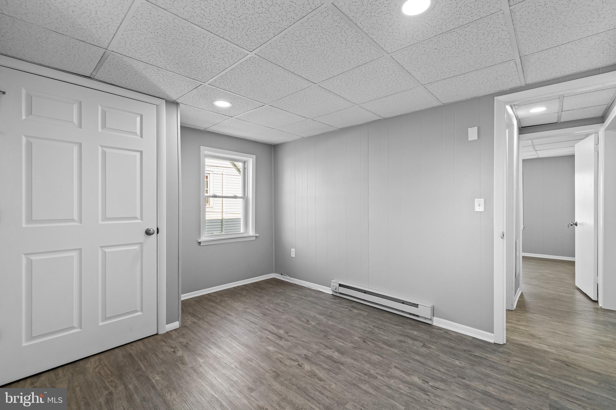 1480 Seven Valleys Road, Unit 2 York, PA 17408 - Photo 13 of 19 wooden floor in an empty room