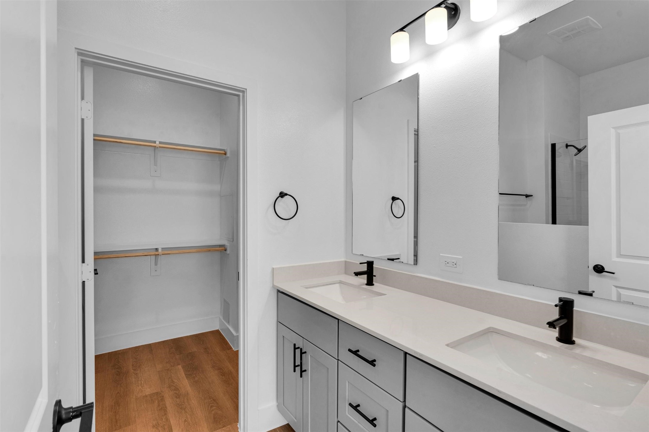 1419 B Soccer Drive Little Elm, TX 75068 - Photo 19 of 38 a bathroom with a sink and mirror