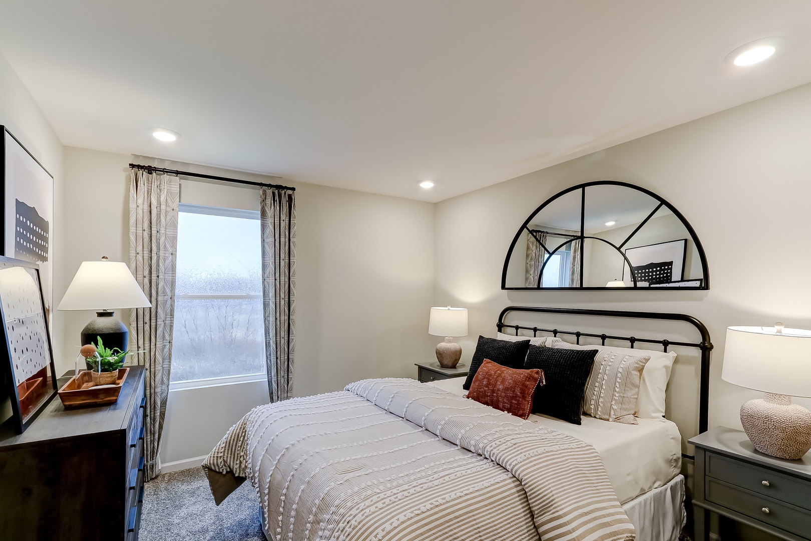 720 Cloverleaf Drive Marengo, IL 60152 - Photo 33 of 33 a bedroom with a bed and a mirror