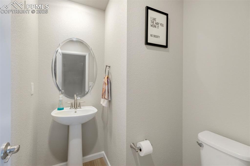 2028 Peridot Loop Colorado Springs, CO 80908 - Photo 13 of 24 Half bath on Main level