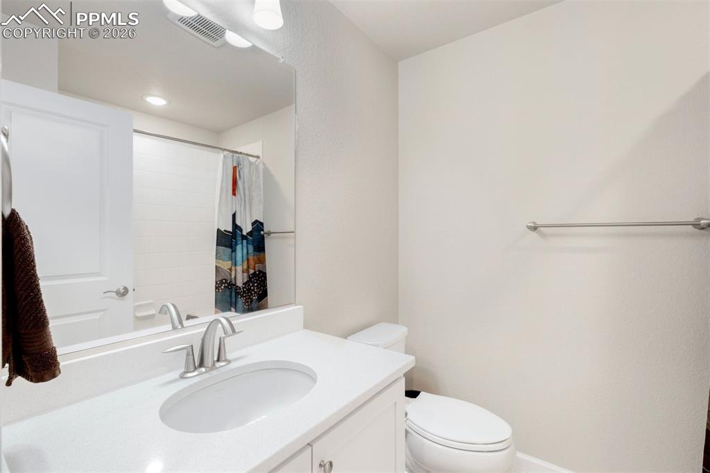 2028 Peridot Loop Colorado Springs, CO 80908 - Photo 21 of 24 Full bathroom on the upper level