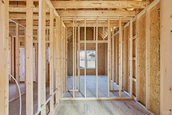 a view of an entryway with a floor to ceiling window