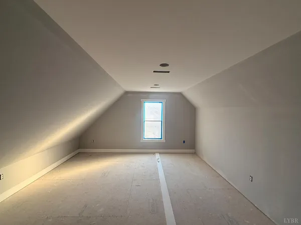 a view of a hallway with a door