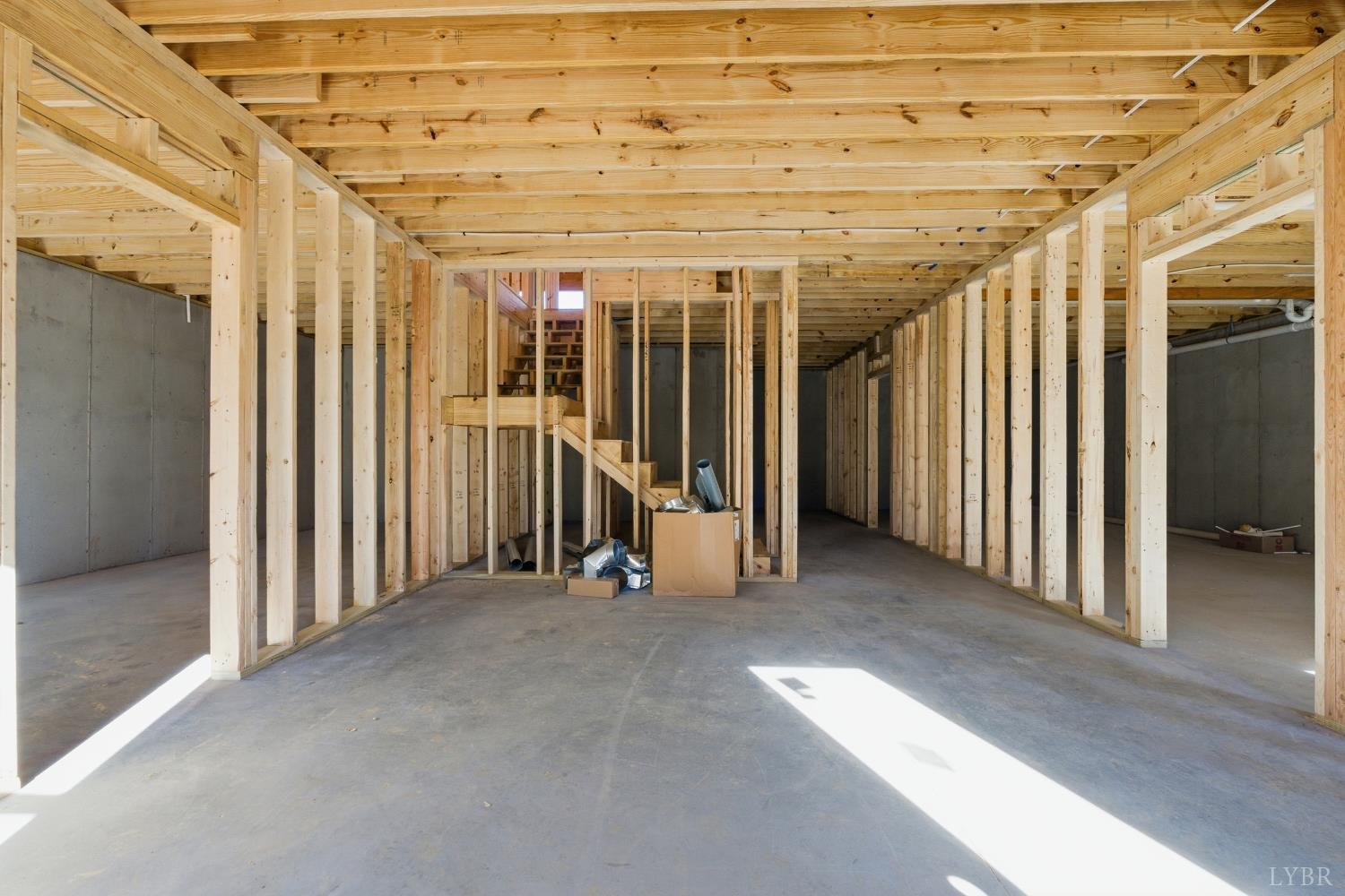20 Semmes Court Rustburg, VA 24588 - Photo 21 of 33 a view of a hallway with wooden stairs