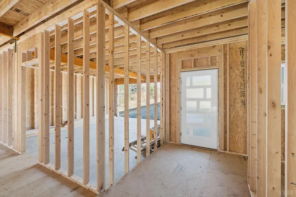 a view of a porch with wooden floor and stairs