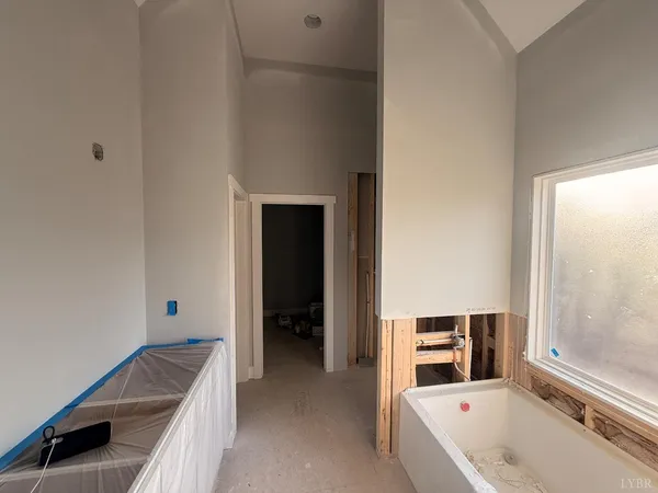 a bathroom with a bathtub and a sink