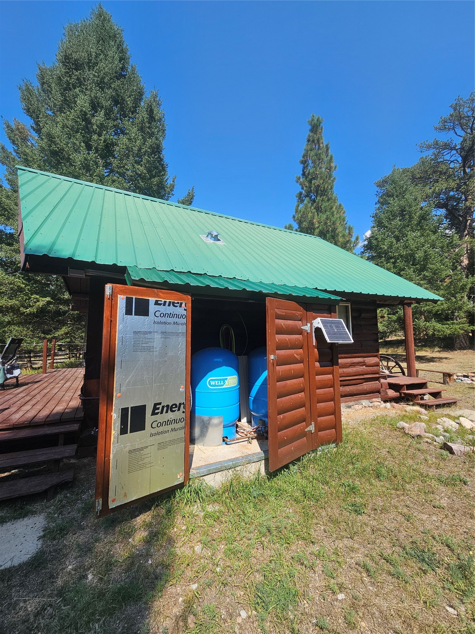 8880 Elk Trail Loop Lincoln, MT 59639 - Photo 22 of 55 attached to the kitchen cabin, hot water heater and pressure tanks